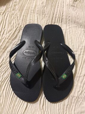 Havaianas Black Flip Flops with Green and Yellow Brazilian Flag Accent